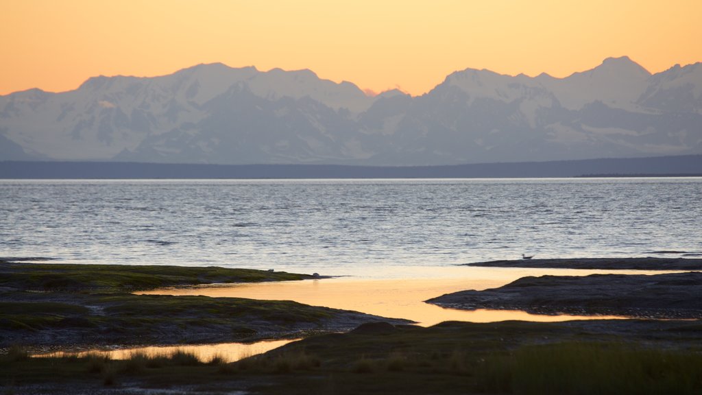 Anchorage featuring general coastal views and a sunset