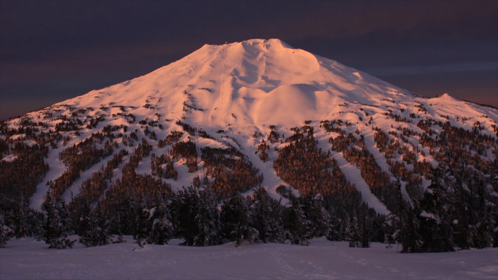 Mt. Bachelor Ski Resort which includes snow, mountains and a sunset