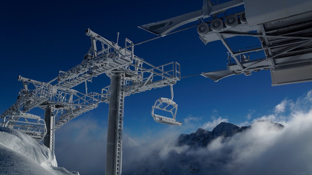 Encamp-Grandvalira Ski Area showing a gondola and snow