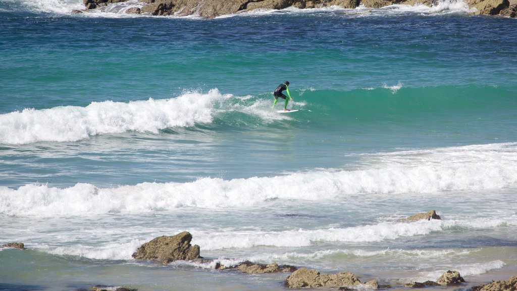 Fistral Beach showing surf, surfing and a beach