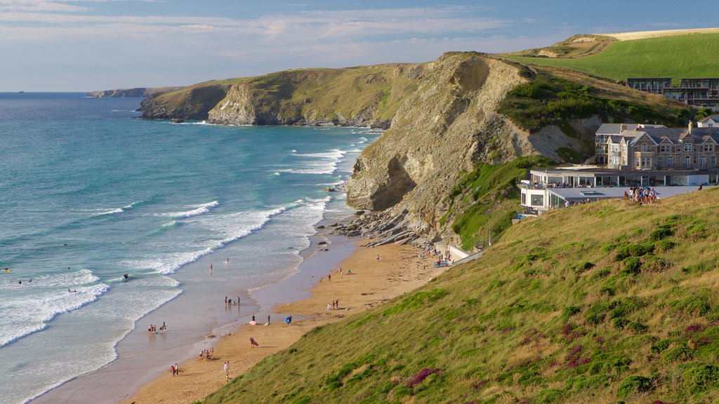 Watergate Bay showing a beach, a coastal town and landscape views