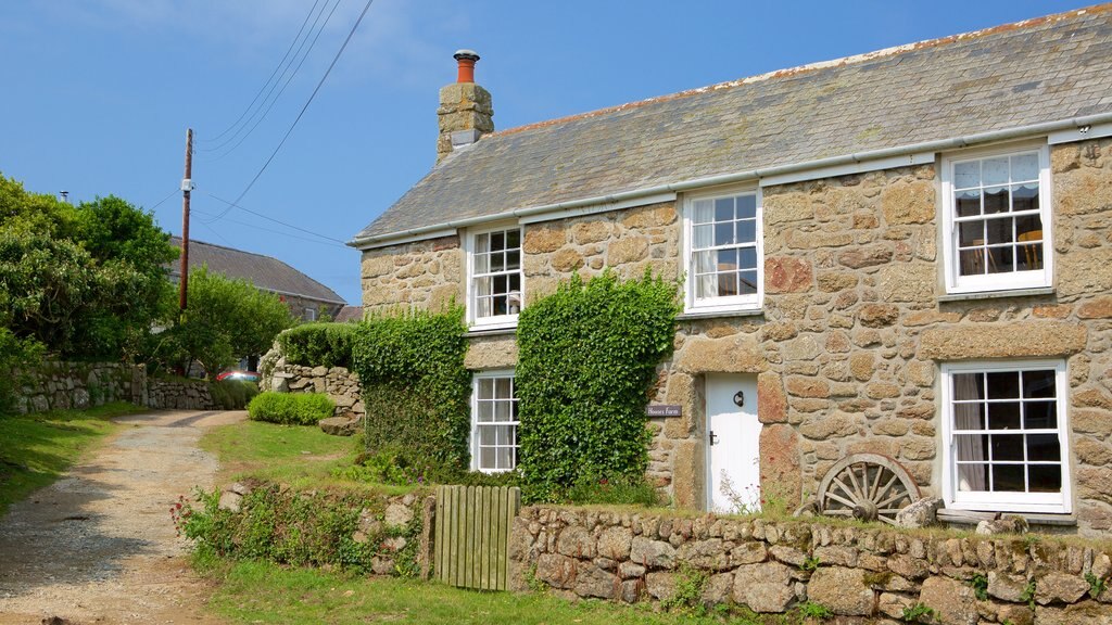 Penzance qui includes une maison et une ville côtière