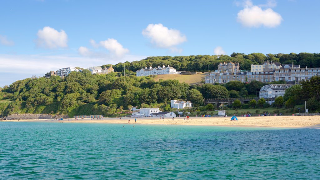 Porthminster Beach showing a beach and a coastal town