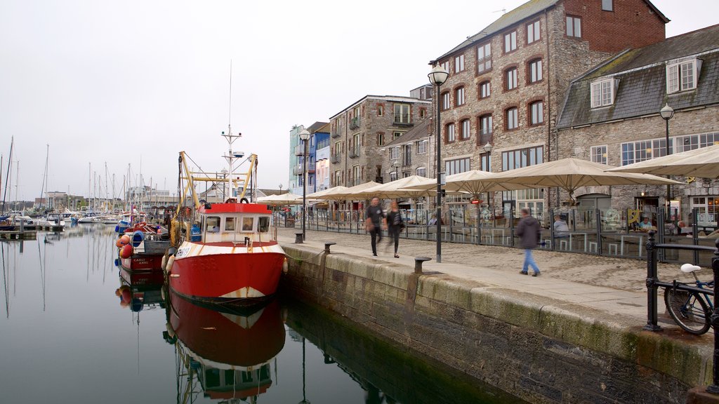 Plymouth featuring a coastal town, a marina and street scenes