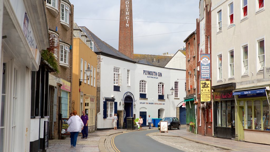 Plymouth which includes signage, street scenes and a coastal town