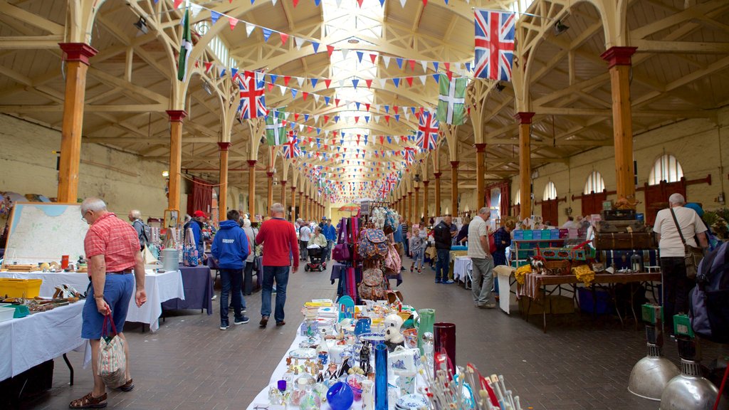 Pannier Market featuring markets and interior views as well as a large group of people