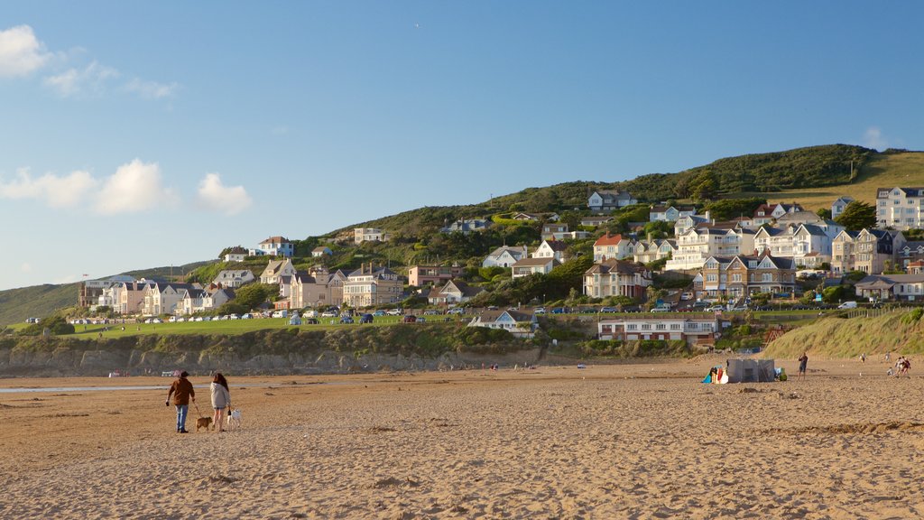 Woolacombe which includes a beach and a coastal town