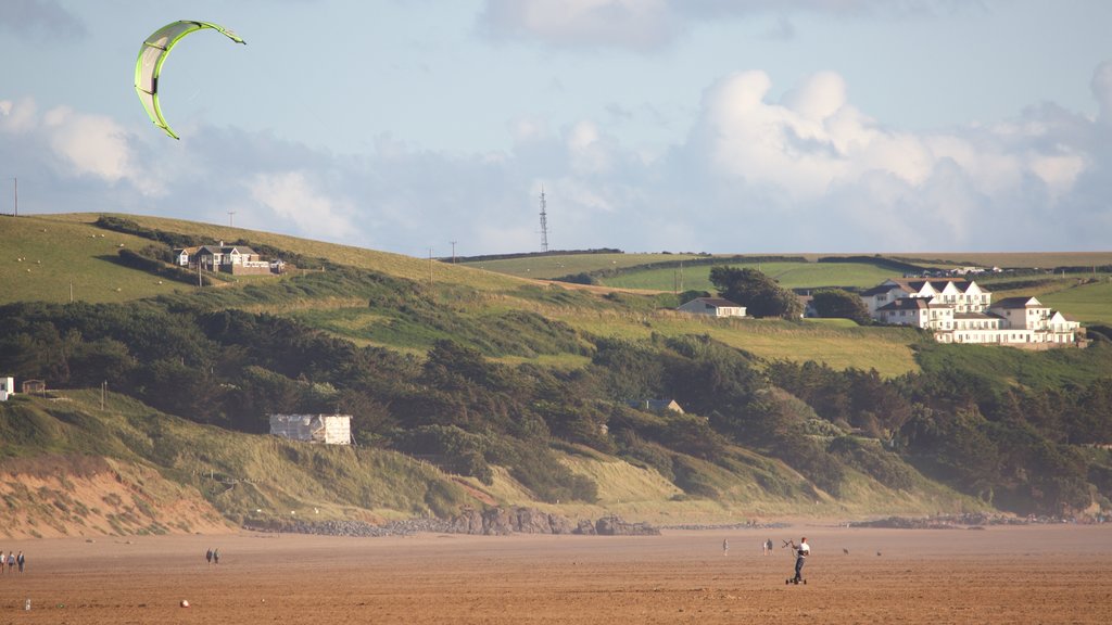 Woolacombe which includes a beach, kite surfing and tranquil scenes