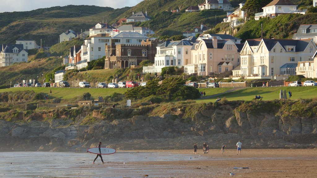 Woolacombe which includes a beach, a coastal town and surfing