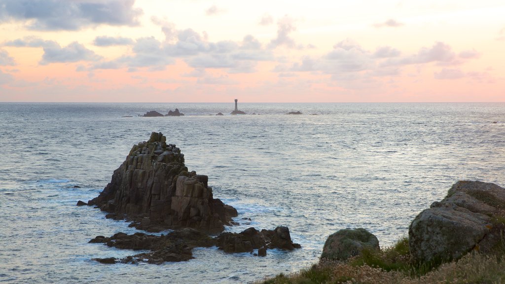 Land\'s End showing a sunset and rugged coastline