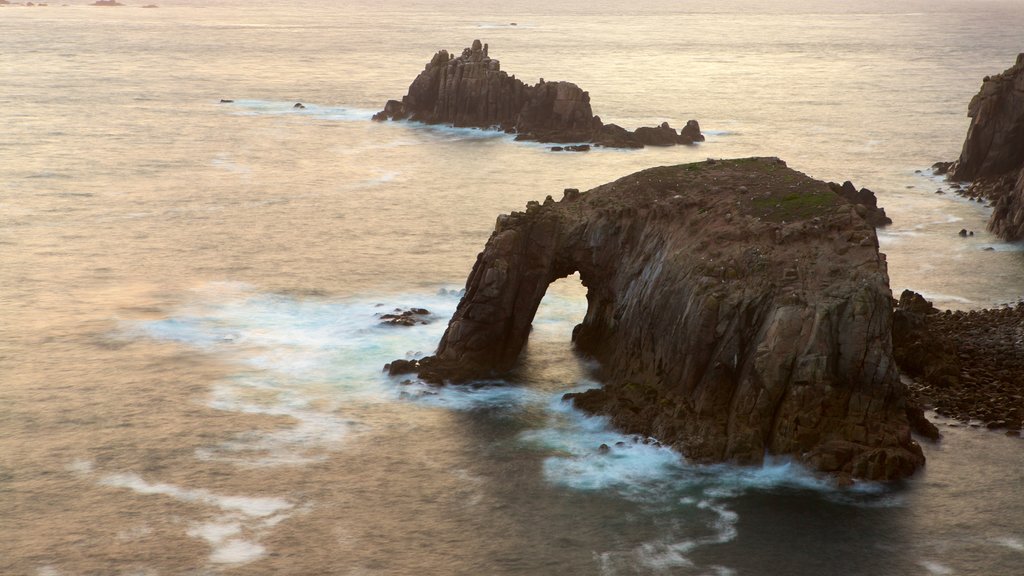 Land\'s End featuring a sunset and rocky coastline