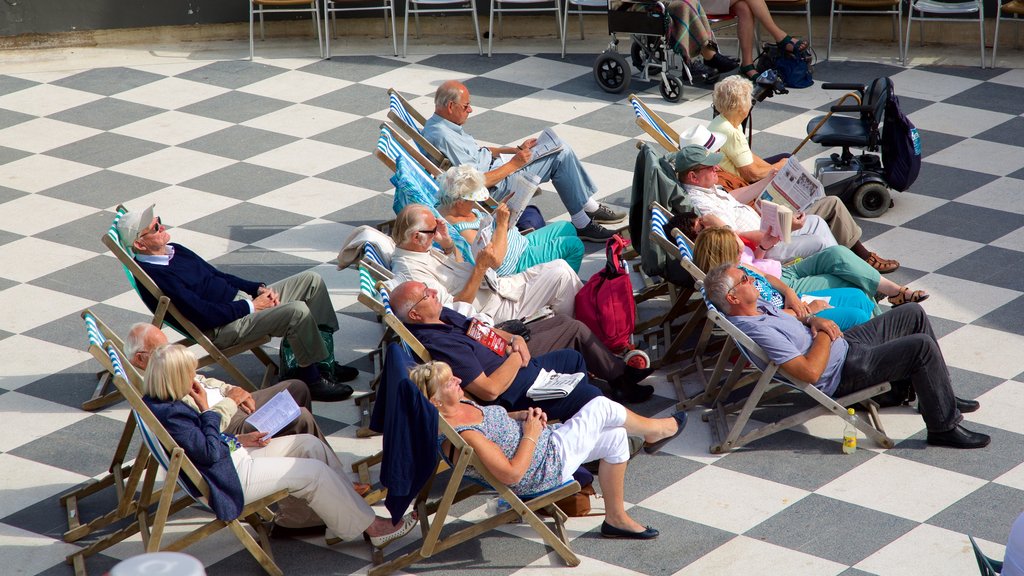 Scarborough Spa showing theatre scenes as well as a large group of people