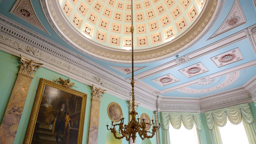 Powderham Castle featuring interior views, art and château or palace