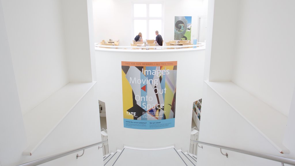 Tate St. Ives featuring interior views and signage