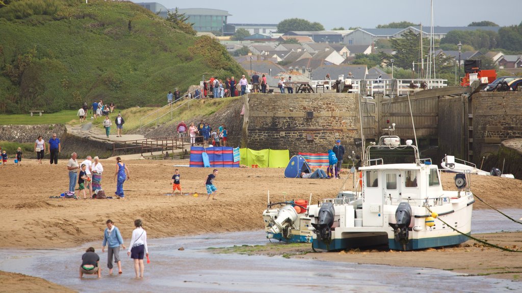 Bude Beach which includes a bay or harbour, a sandy beach and a coastal town