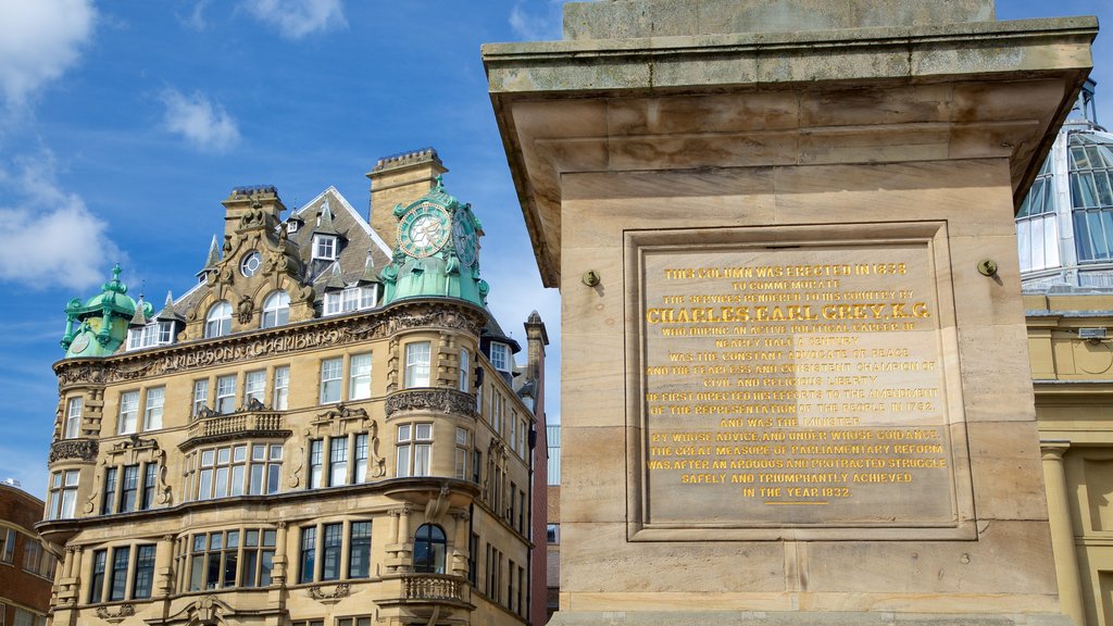 Grey\'s Monument featuring heritage architecture, signage and a monument