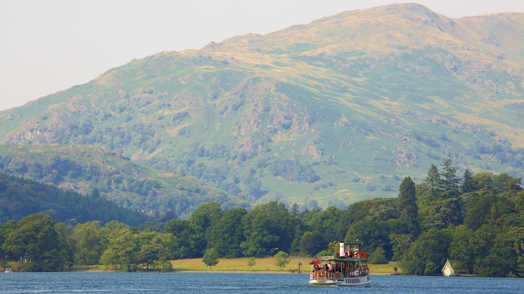 Lake District Visitor Centre at Brockhole showing a ferry, a lake or waterhole and mountains