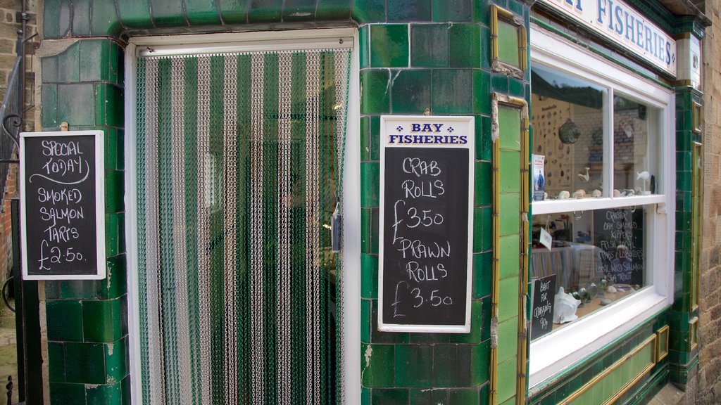 Robin Hood\'s Bay Beach featuring signage