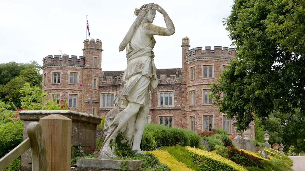 Mt. Edgcumbe showing a garden, château or palace and a statue or sculpture