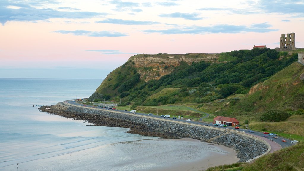 North Bay Beach showing landscape views, a coastal town and a sandy beach