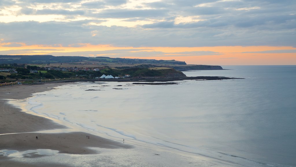 North Bay Beach showing a beach, landscape views and a sunset