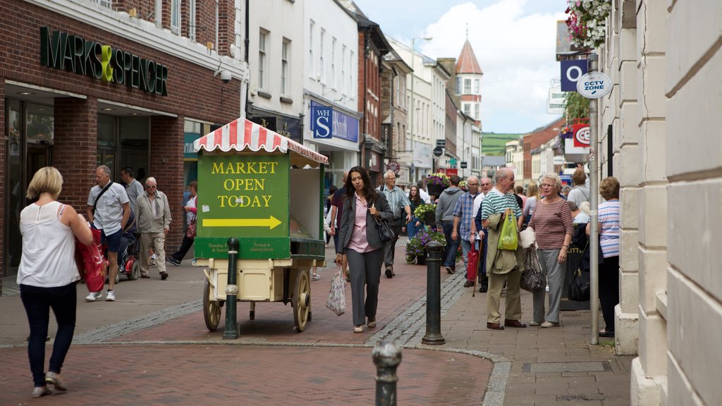 Pannier Market showing markets and signage as well as a large group of people