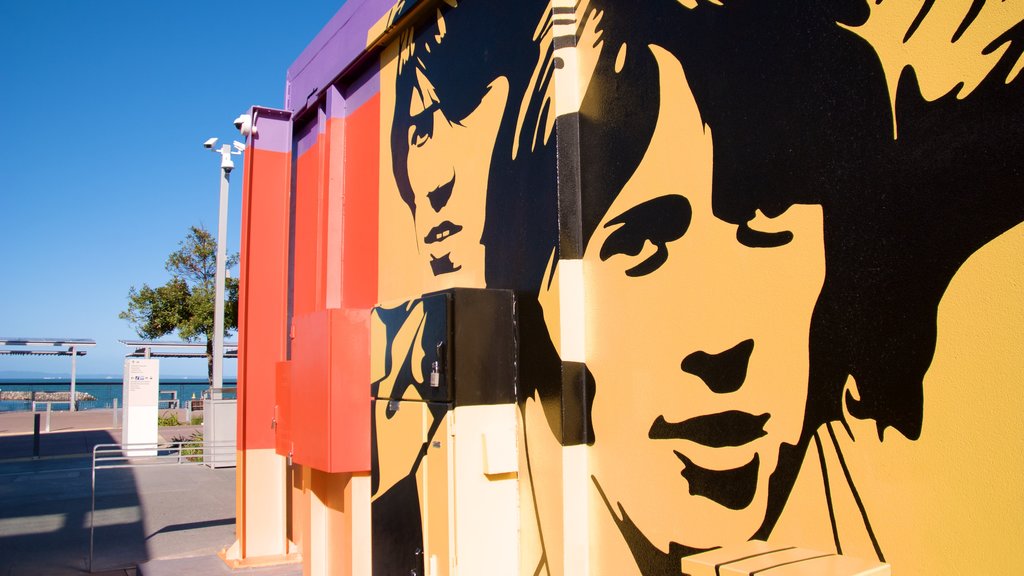 Bee Gees Way which includes outdoor art and general coastal views