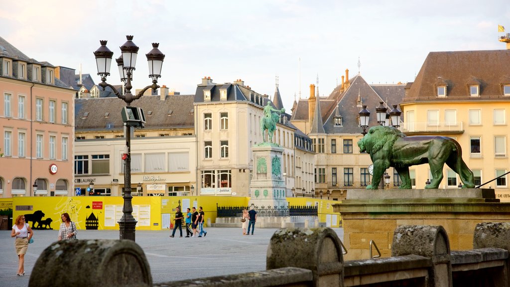 Luxembourg which includes a statue or sculpture, a square or plaza and heritage architecture