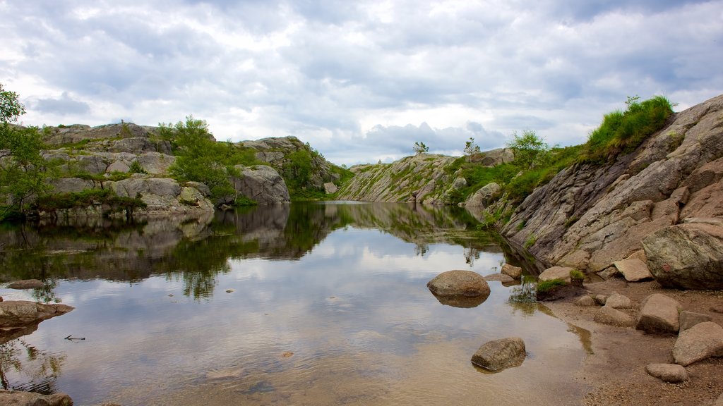 Preikestolen featuring a lake or waterhole