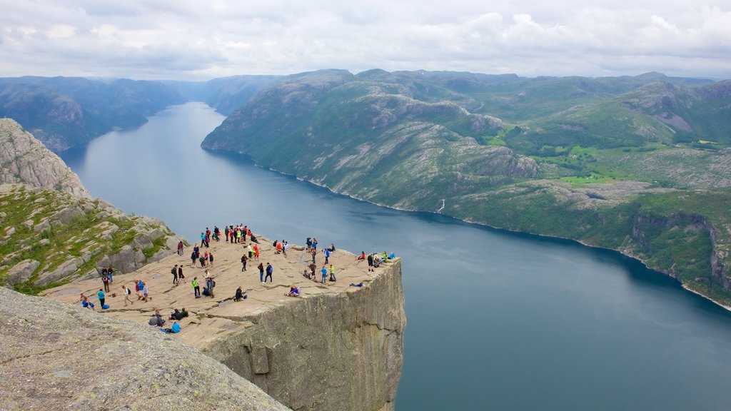 Preikestolen showing a lake or waterhole, landscape views and views