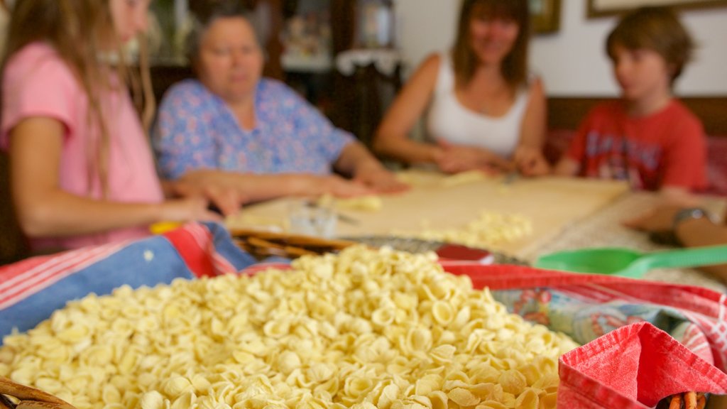 Bari showing food as well as a family