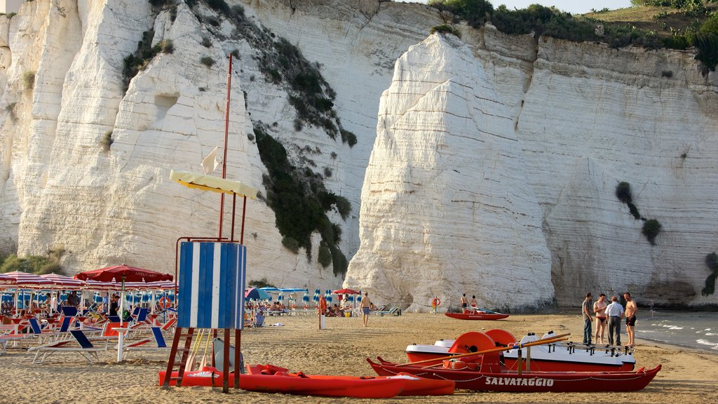 Pizzomuou featuring rugged coastline and a sandy beach