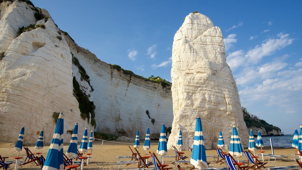 Pizzomuou showing a sandy beach and rocky coastline