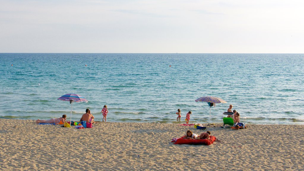 Baia Verde Beach showing general coastal views and a sandy beach