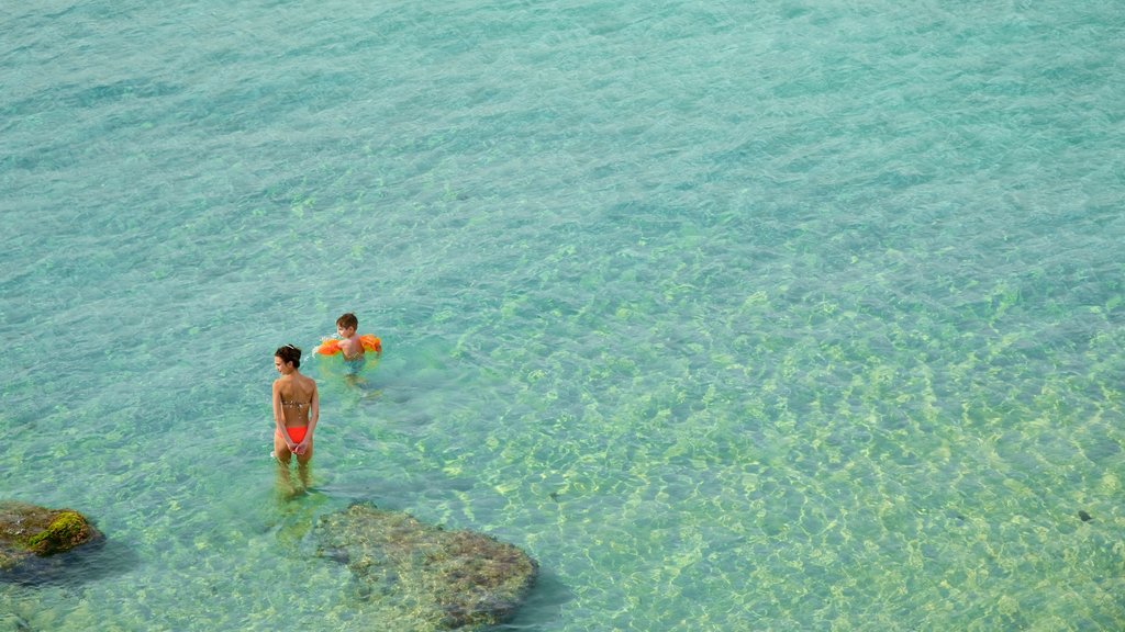 Lecce featuring general coastal views as well as children