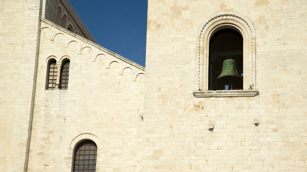 Basilica of San Nicola which includes religious aspects, a church or cathedral and heritage architecture