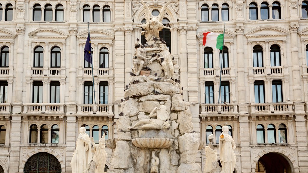 Piazza dell\'Unita showing a statue or sculpture and heritage architecture