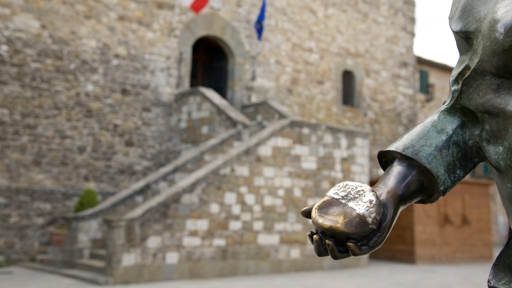 Castellina in Chianti showing a statue or sculpture and heritage architecture