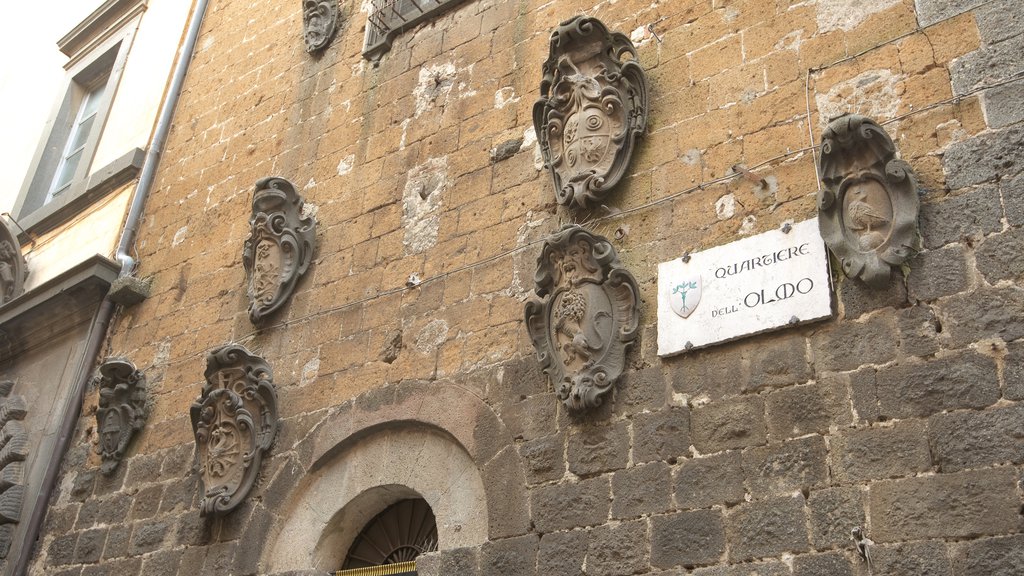 Moro Tower featuring signage and heritage architecture