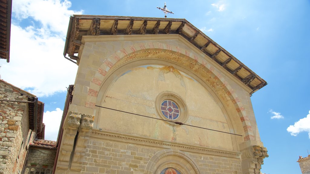 Radda in Chianti ofreciendo arquitectura patrimonial, una pequeña ciudad o aldea y una iglesia o catedral