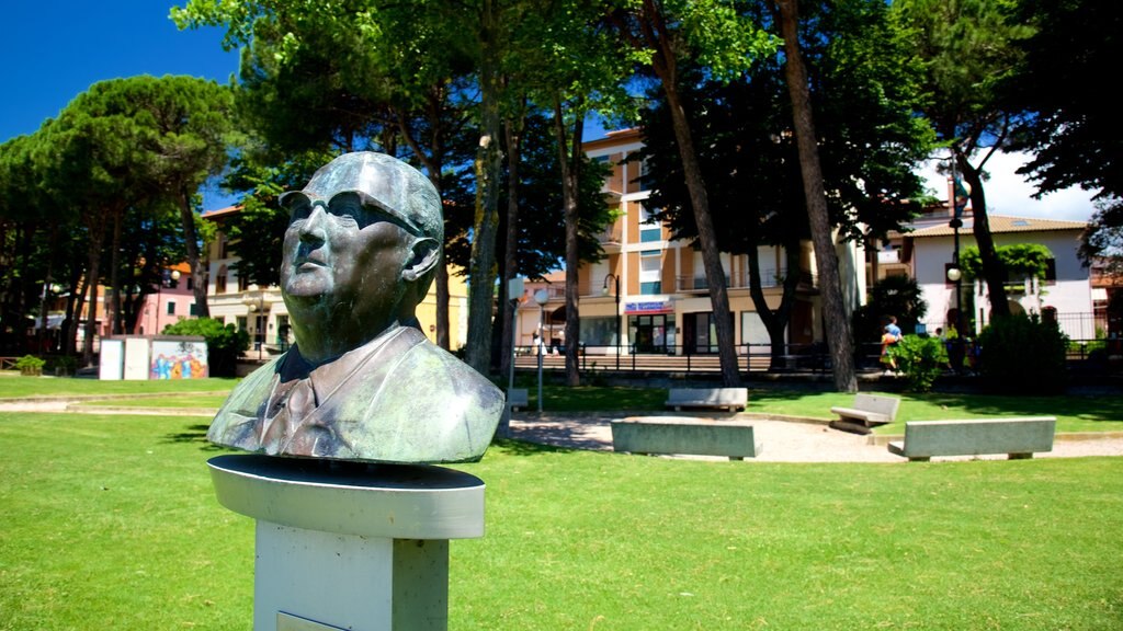 Passignano sul Trasimeno showing a garden and a statue or sculpture