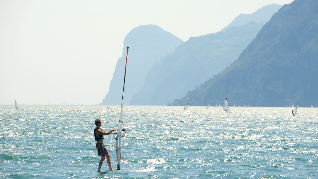 Nago-Torbole featuring general coastal views, mountains and windsurfing