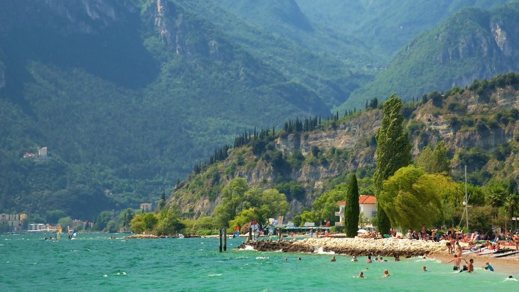 Nago-Torbole showing swimming, mountains and general coastal views