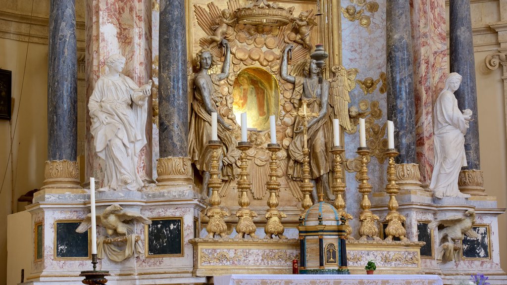 Santa Maria della Consolazione, Todi, Italia ofreciendo elementos religiosos, una estatua o escultura y una iglesia o catedral