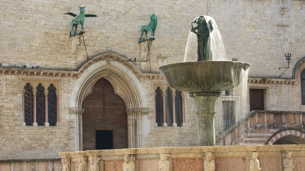 Fontana Maggiore featuring a fountain, a statue or sculpture and heritage architecture