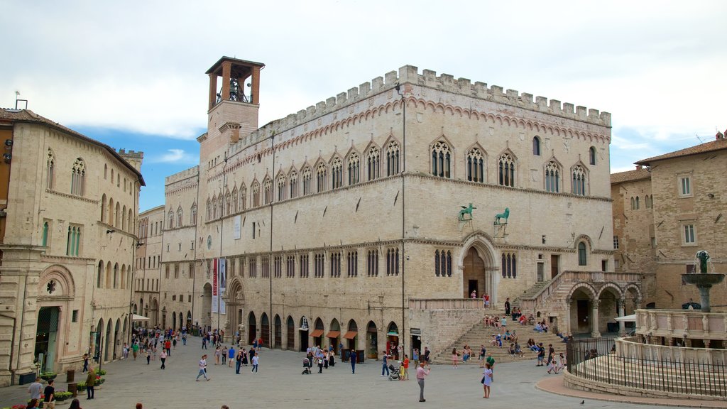 Piazza IV Novembre som inkluderar ett torg, en stad och en fontän