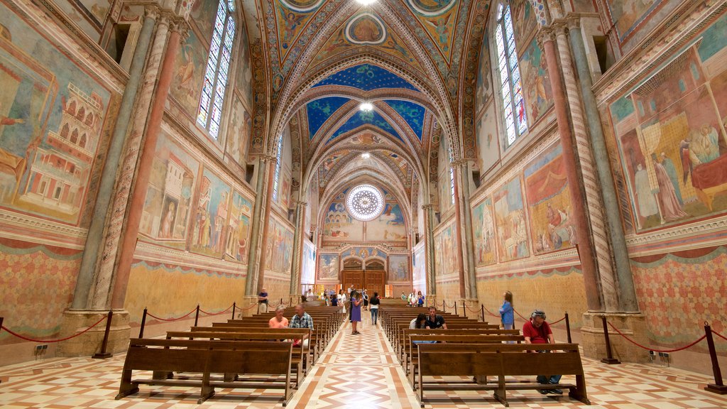 Papal Basilica of St. Francis of Assisi showing a church or cathedral, religious aspects and interior views