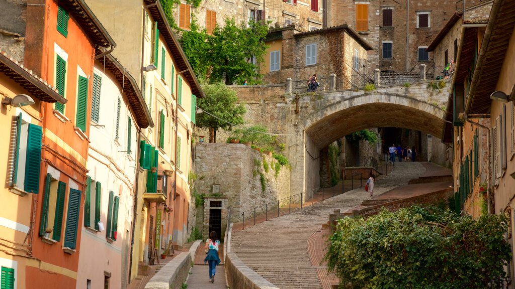 Roman Aqueduct showing street scenes and a small town or village