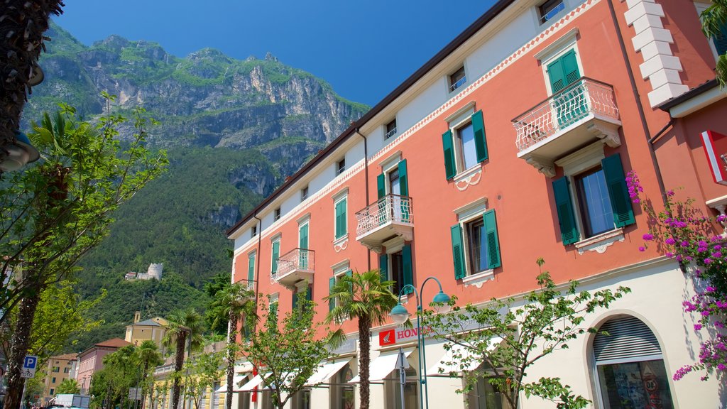 Trentino showing a coastal town, a hotel and heritage architecture