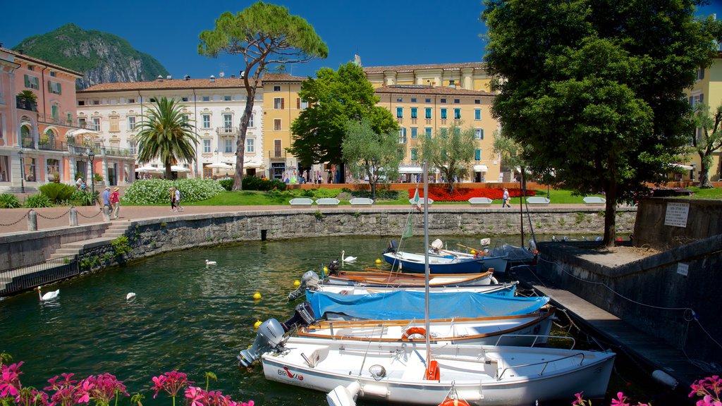 Trentino which includes a lake or waterhole and sailing